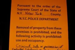 The restraining order posted outside Santos Party House.